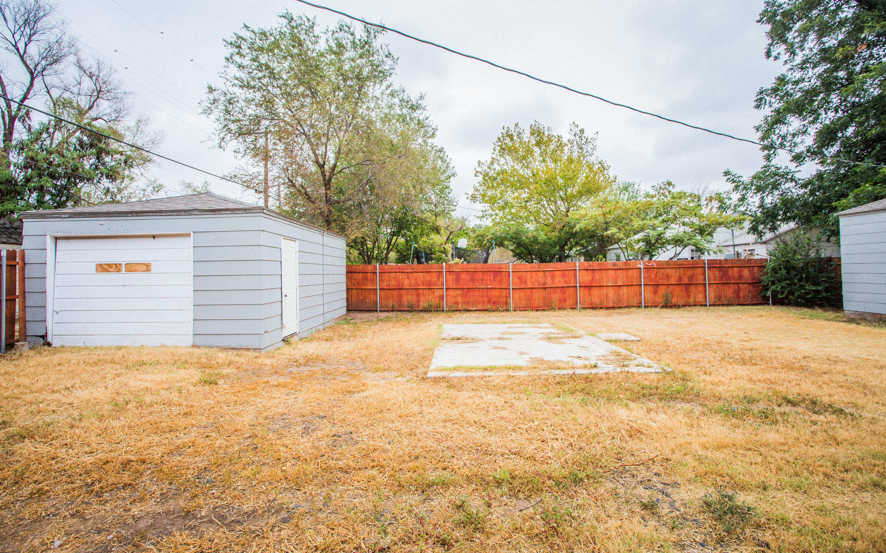 1518 40th Street Lubbock, TX 79412 - Photo 12 of 13 a view of a backyard of the house