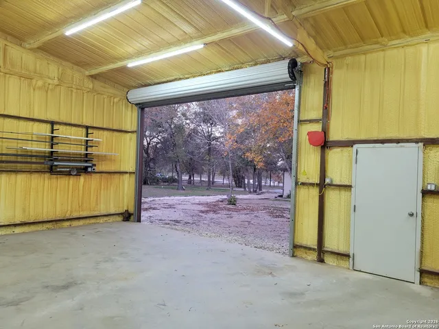 a view of staircase with white walls