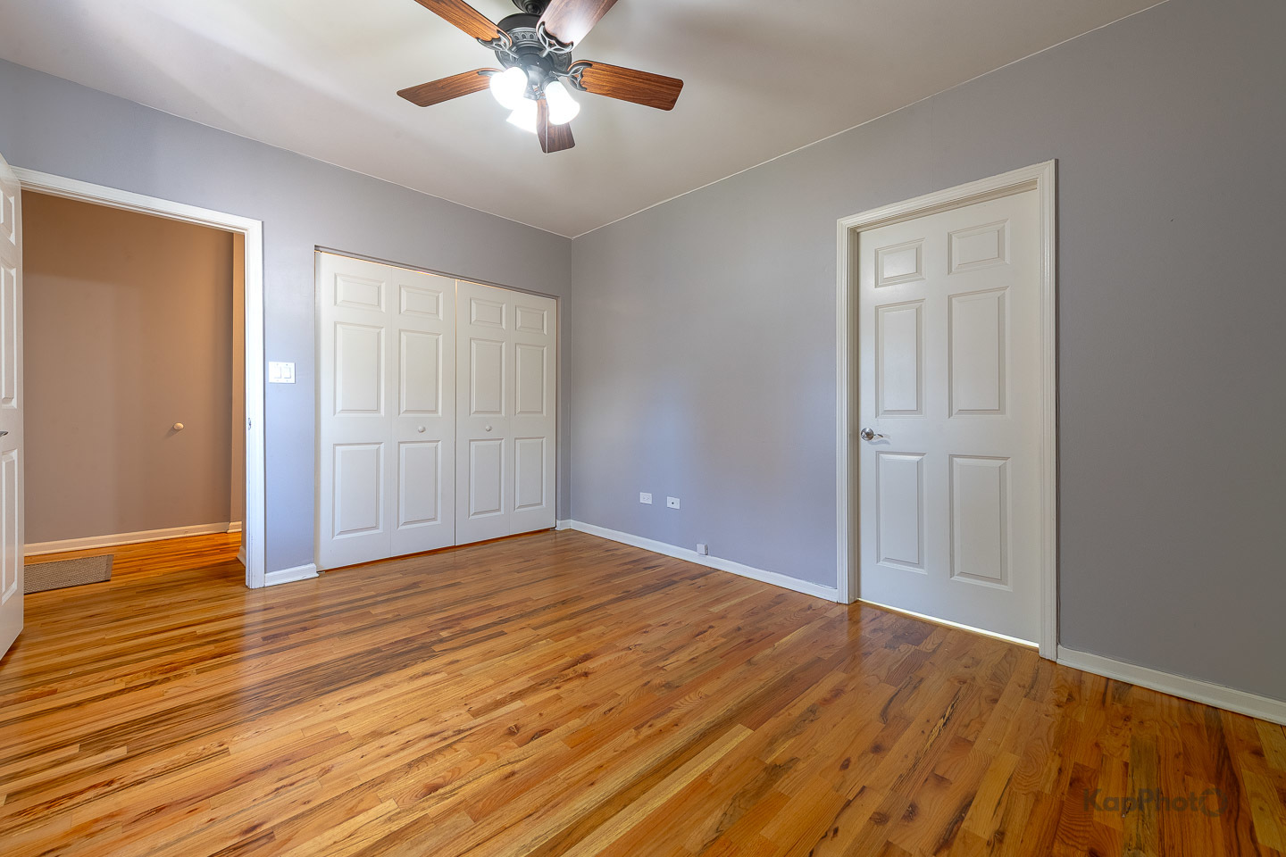 2142 West Madison Street, Unit 1 Chicago, IL 60612 - Photo 14 of 27 a view of an empty room with wooden floor