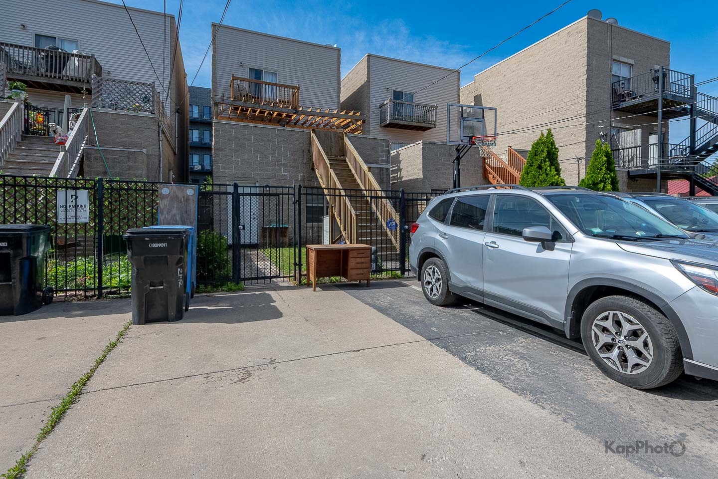 2142 West Madison Street, Unit 1 Chicago, IL 60612 - Photo 27 of 27 a view of a car parked in front of a building