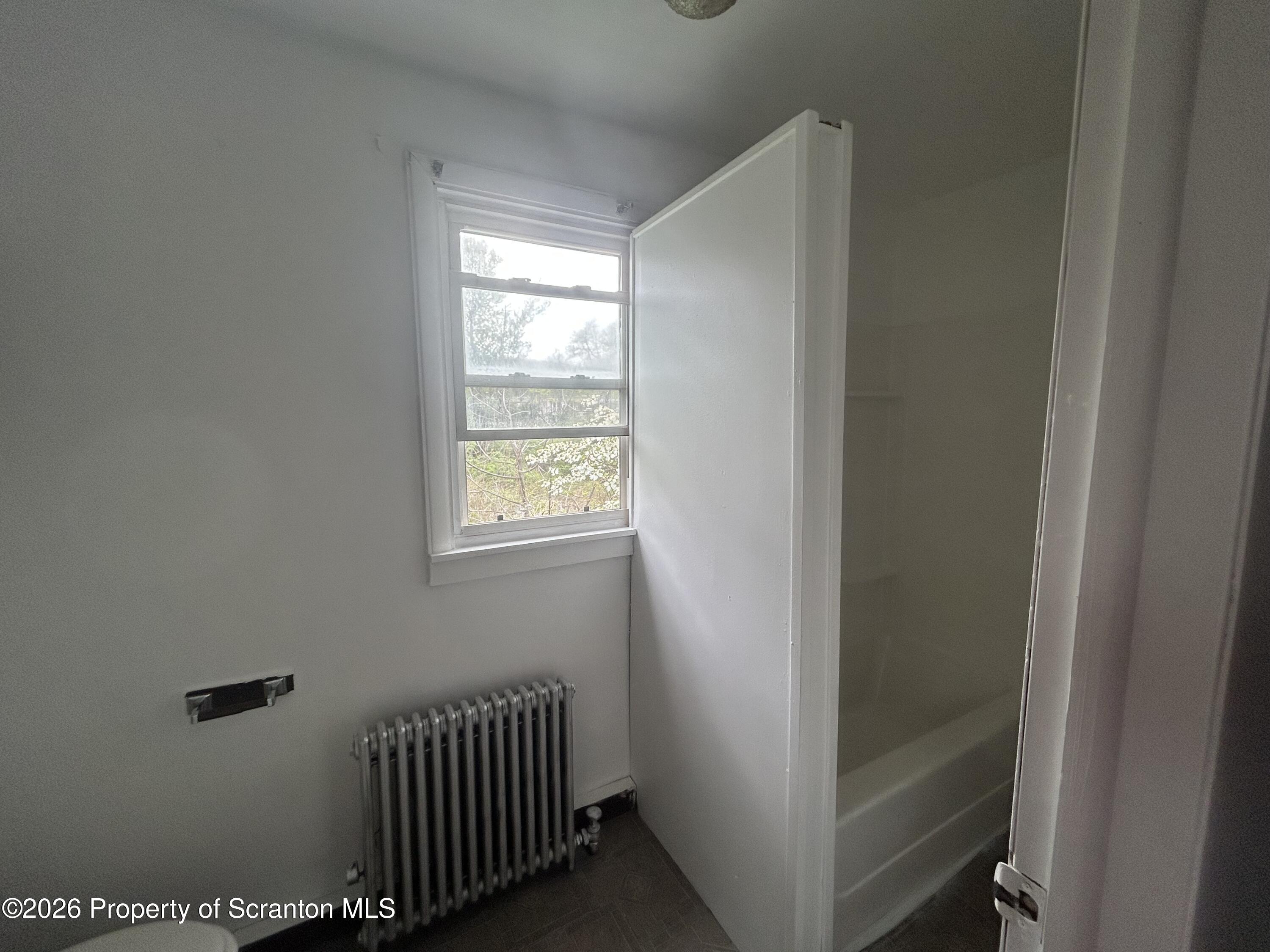 717 East Elm Street, Unit REAR Scranton, PA 18505 - Photo 2 of 9 a view of hallway with window