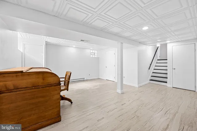 a room with a furniture and wooden floor