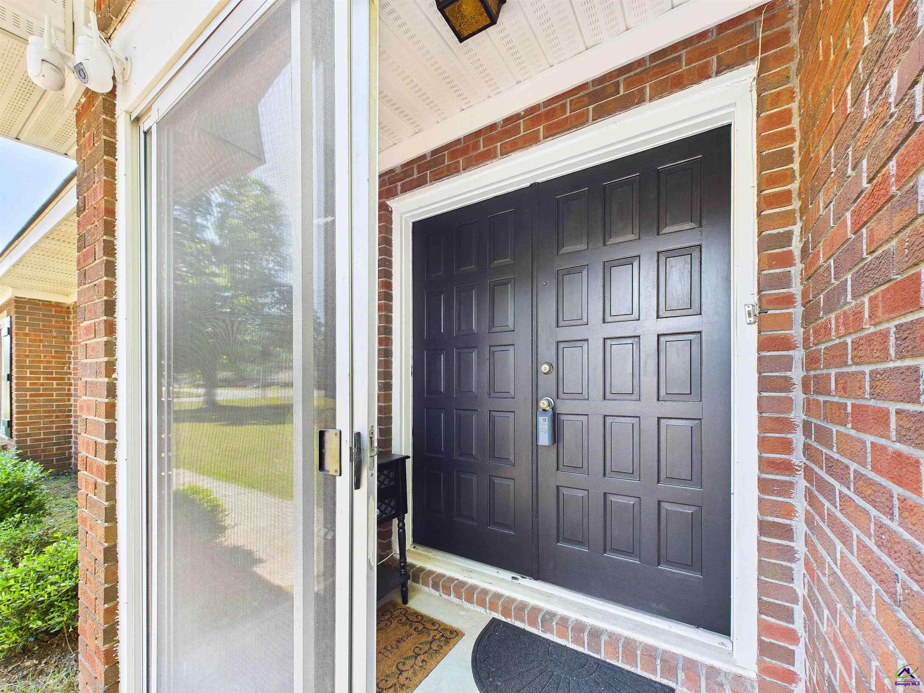 400 Feagin Mill Road Warner Robins, GA 31005 - Photo 6 of 53 a view of a door and a window