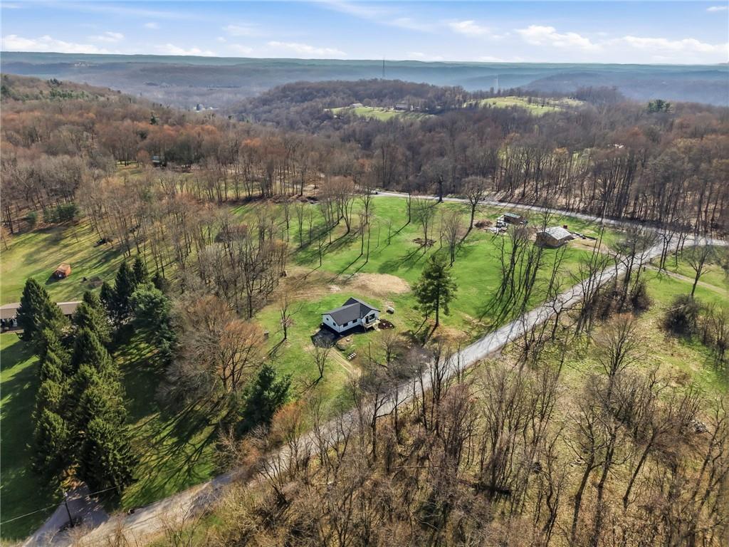 311 Oakdale Road Darlington, PA 16115 - Photo 12 of 32 a view of a lake with a mountain in the background