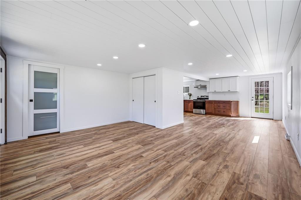 311 Oakdale Road Darlington, PA 16115 - Photo 15 of 32 a view of empty room with kitchen and window