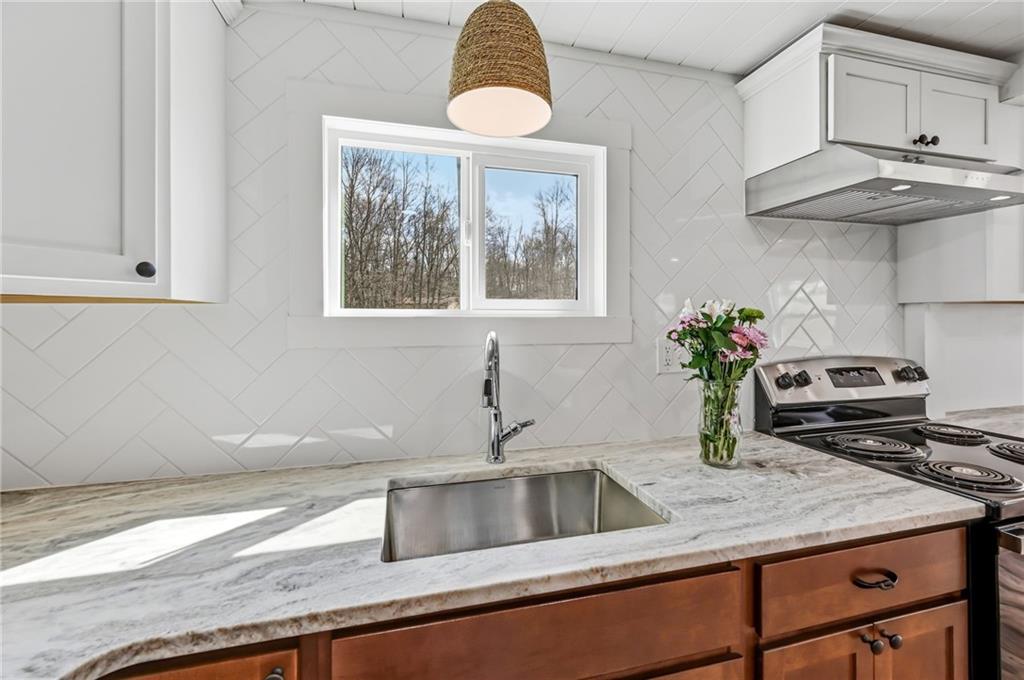 311 Oakdale Road Darlington, PA 16115 - Photo 20 of 32 a kitchen with a sink and a window