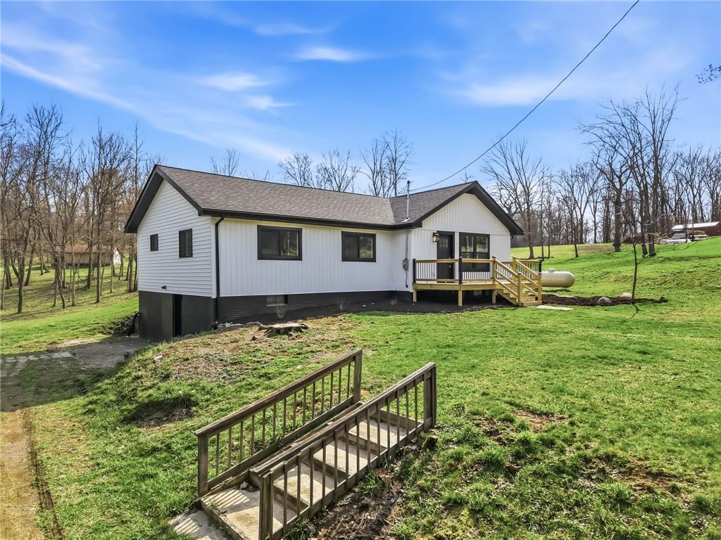 311 Oakdale Road Darlington, PA 16115 - Photo 2 of 32 a view of a house with a yard