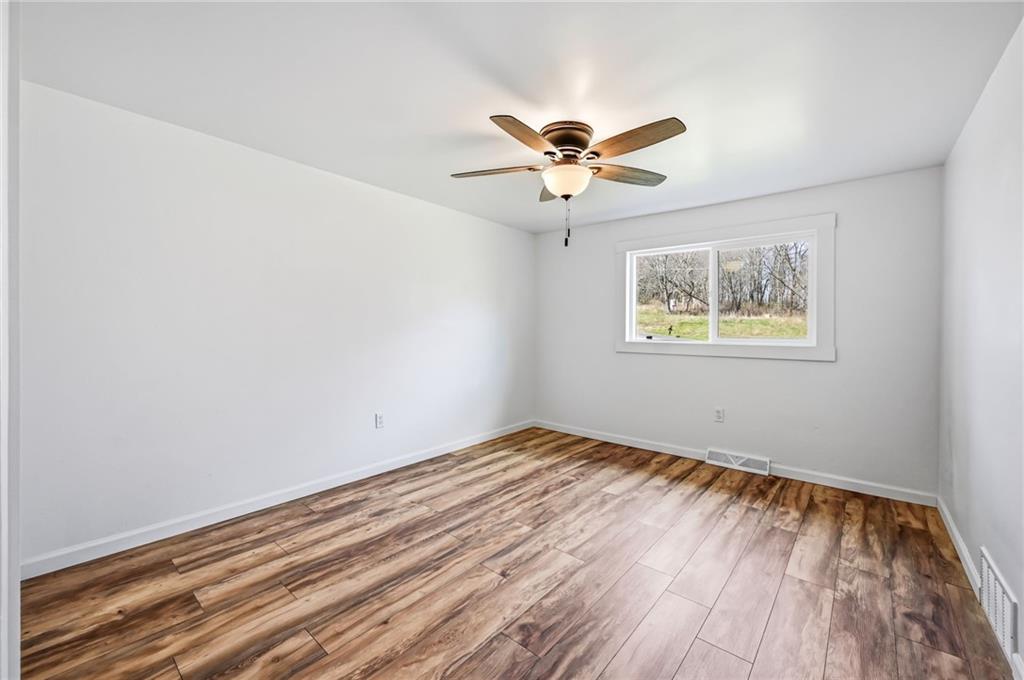 311 Oakdale Road Darlington, PA 16115 - Photo 23 of 32 a view of empty room with wooden floor