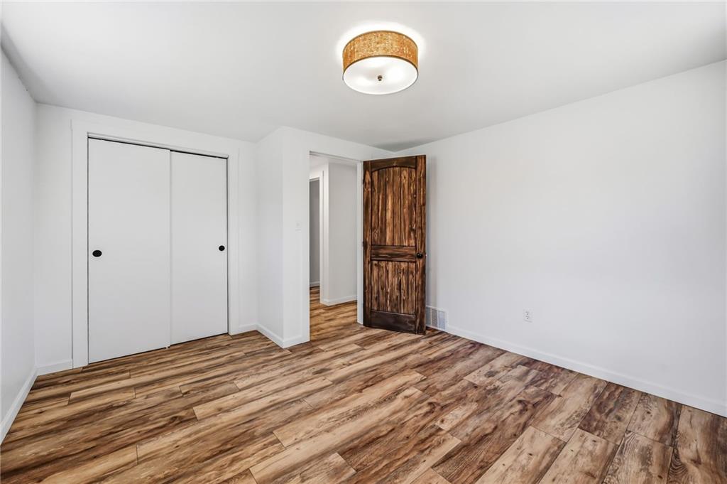 311 Oakdale Road Darlington, PA 16115 - Photo 26 of 32 a view of a room with wooden floor