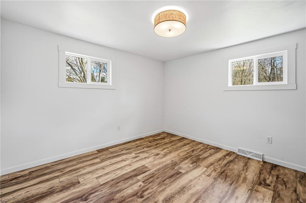 311 Oakdale Road Darlington, PA 16115 - Photo 27 of 32 a view of empty room with wooden floor