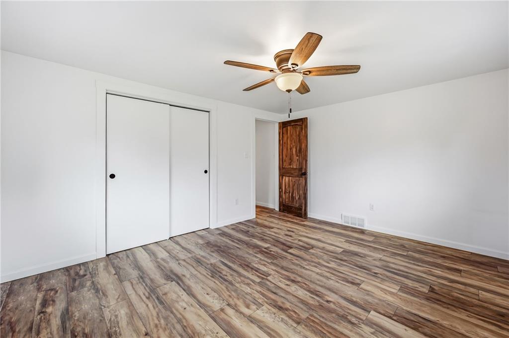 311 Oakdale Road Darlington, PA 16115 - Photo 28 of 32 a view of empty room with wooden floor
