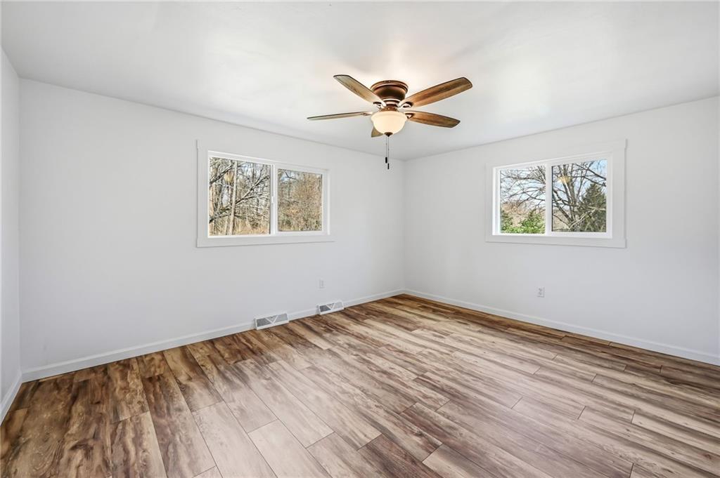 311 Oakdale Road Darlington, PA 16115 - Photo 29 of 32 a view of empty room with wooden floor