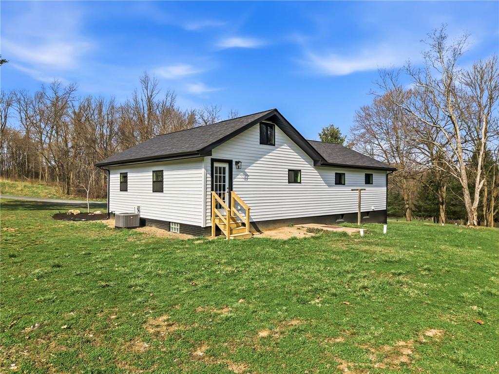311 Oakdale Road Darlington, PA 16115 - Photo 6 of 32 a view of a backyard with a house