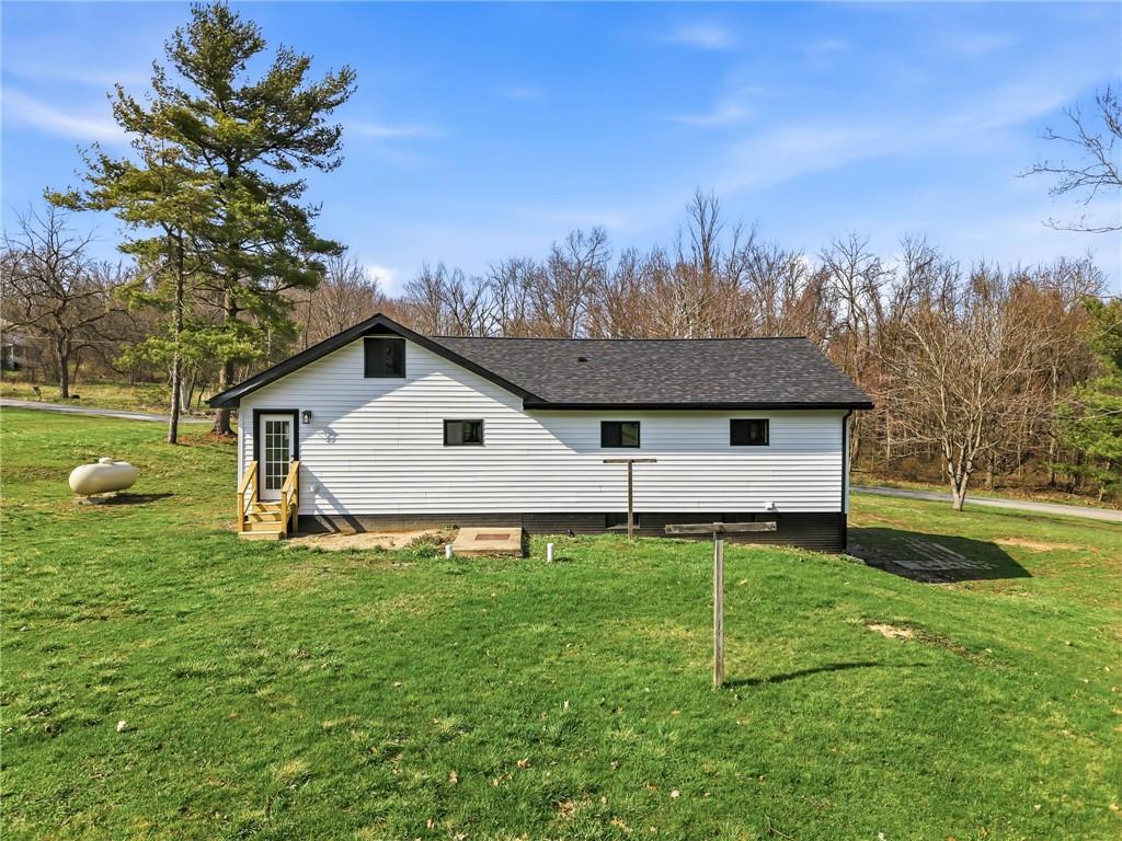 311 Oakdale Road Darlington, PA 16115 - Photo 7 of 32 a house view with a garden space
