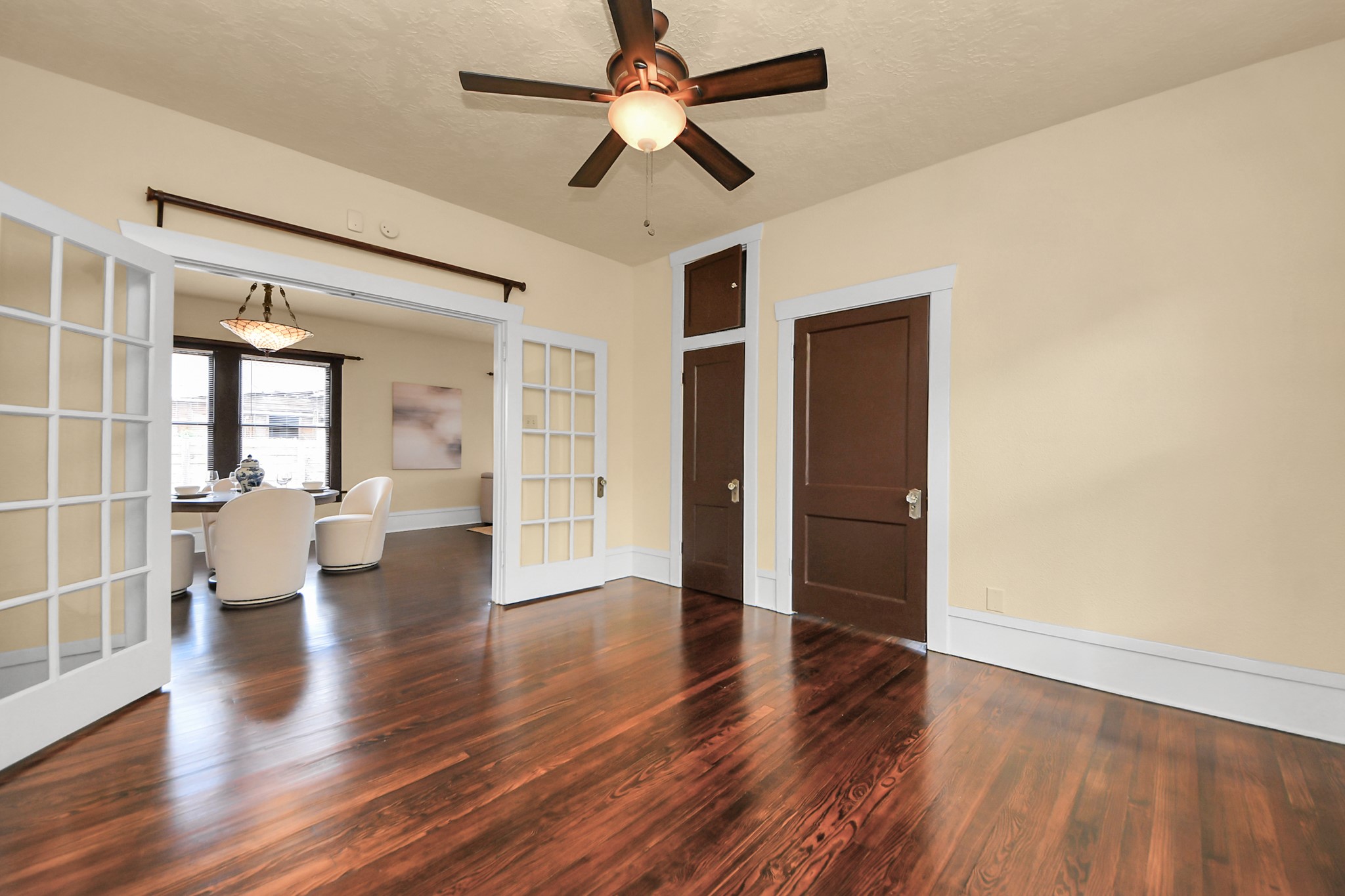 1211 Bingham Street Houston, TX 77007 - Photo 21 of 48 wooden floor in an empty room with a window