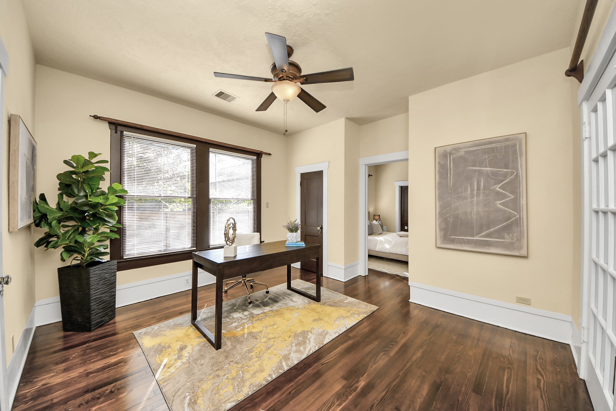 1211 Bingham Street Houston, TX 77007 - Photo 22 of 48 a living room with furniture a window and a potted plant