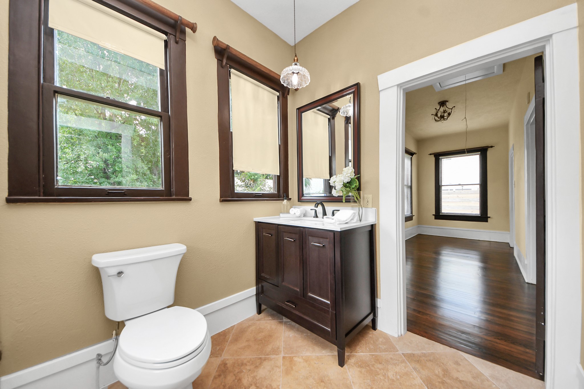 1211 Bingham Street Houston, TX 77007 - Photo 26 of 48 a bathroom with a toilet sink and mirror