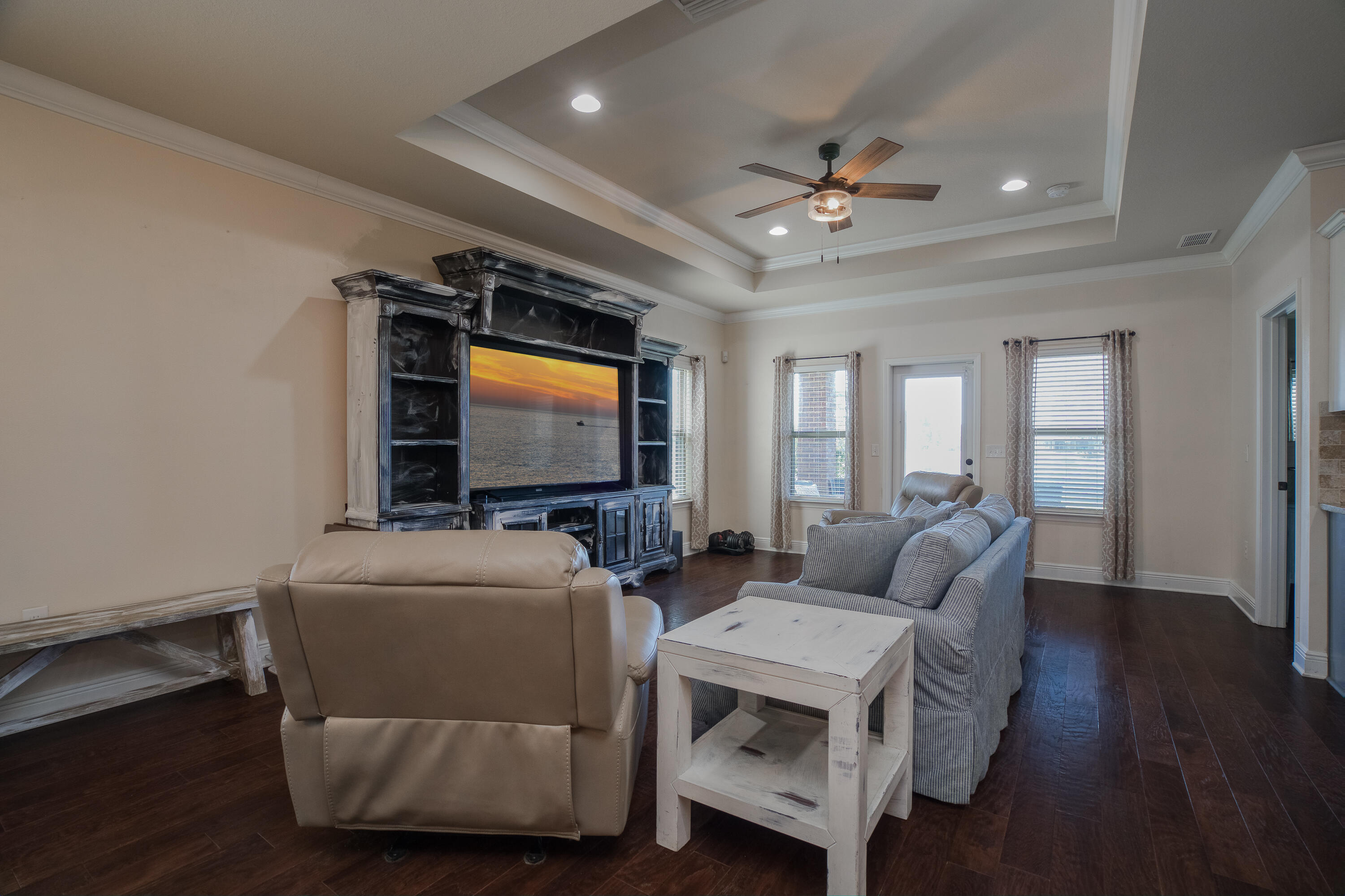 165 Pin Oak Loop Santa Rosa Beach, FL 32459 - Photo 11 of 41 a living room with furniture and a flat screen tv