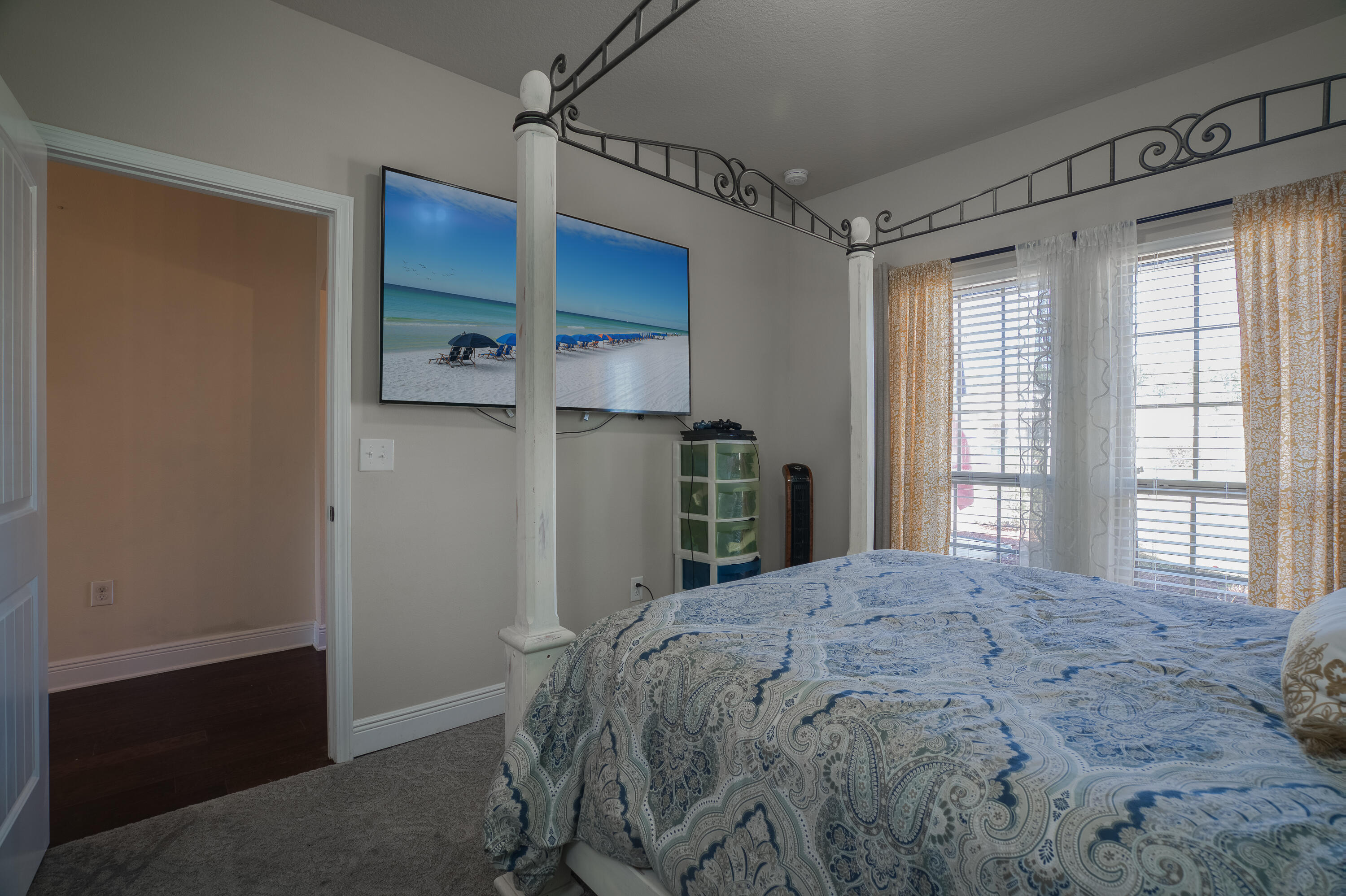 165 Pin Oak Loop Santa Rosa Beach, FL 32459 - Photo 30 of 41 a bed sitting in a bedroom next to a window