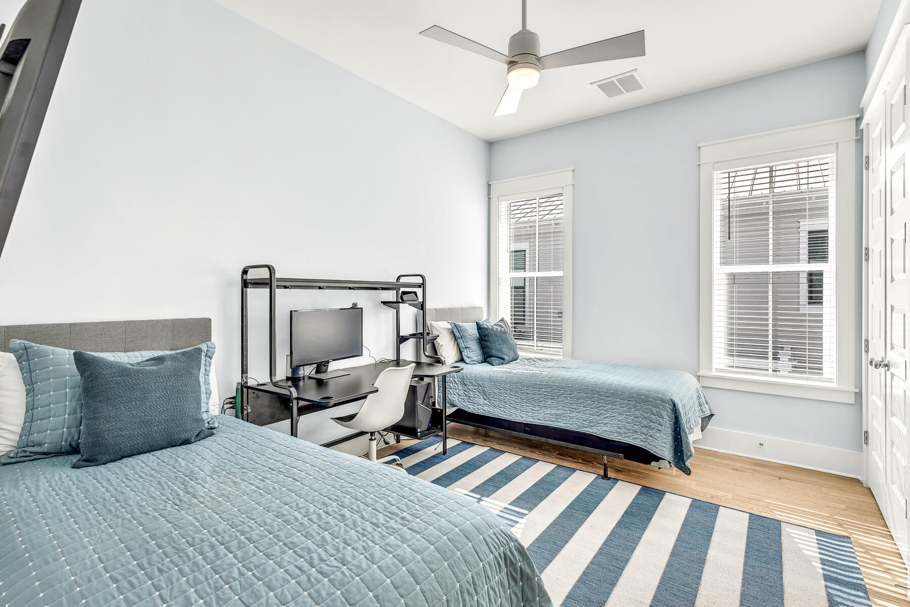 56 Cypress Drive Santa Rosa Beach, FL 32459 - Photo 17 of 61 a bedroom with a bed and wooden floor