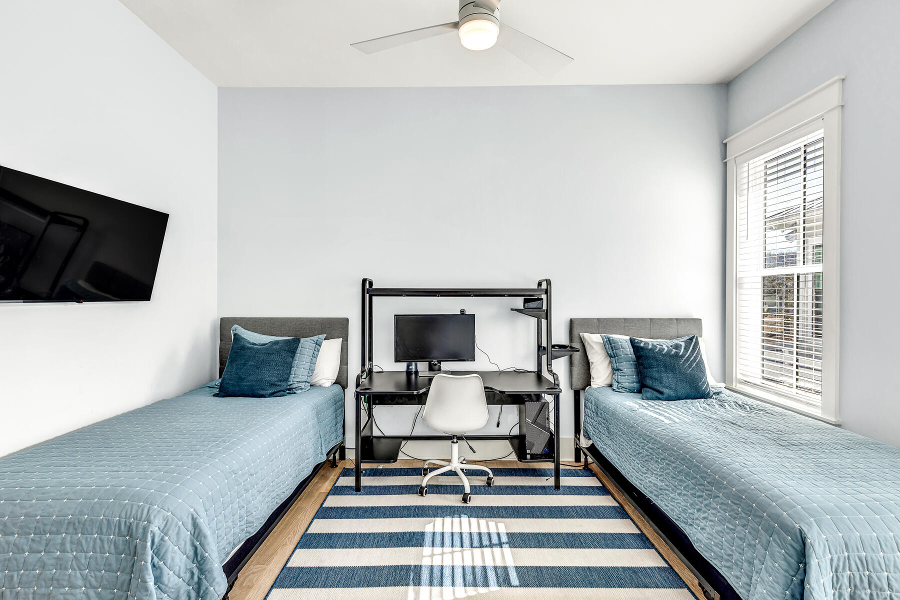 56 Cypress Drive Santa Rosa Beach, FL 32459 - Photo 18 of 61 a living room with a flat screen tv and a fireplace