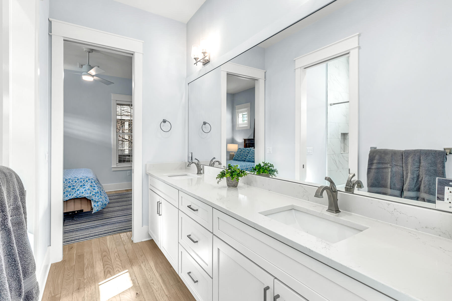 56 Cypress Drive Santa Rosa Beach, FL 32459 - Photo 19 of 61 a spacious en suite bathroom with a sink and mirror with shower