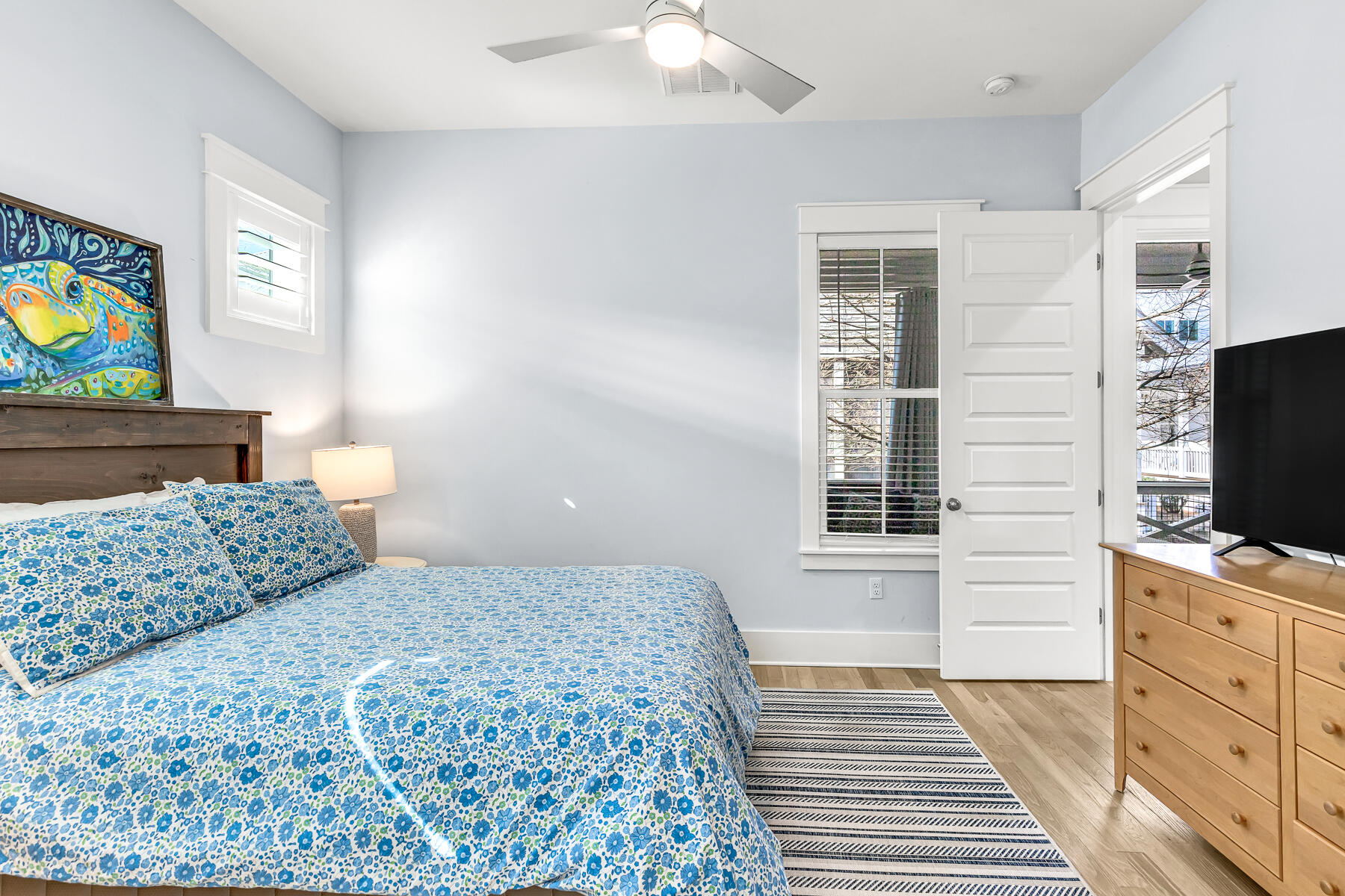 56 Cypress Drive Santa Rosa Beach, FL 32459 - Photo 21 of 61 a bedroom with a bed and flat screen tv