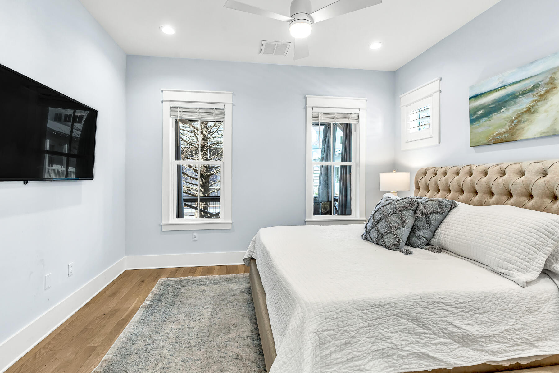 56 Cypress Drive Santa Rosa Beach, FL 32459 - Photo 23 of 61 a bedroom with a bed and a flat screen tv