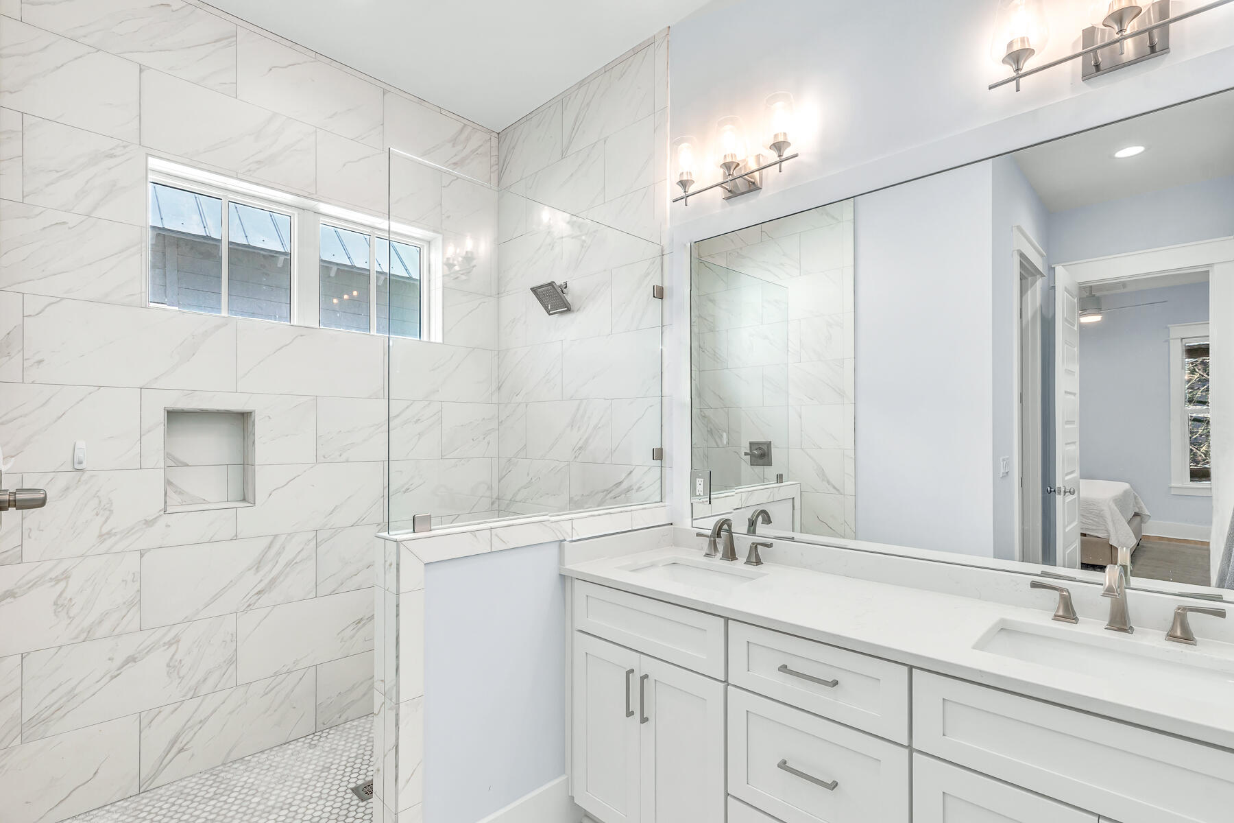 56 Cypress Drive Santa Rosa Beach, FL 32459 - Photo 24 of 61 a bathroom with a double vanity sink and a mirror