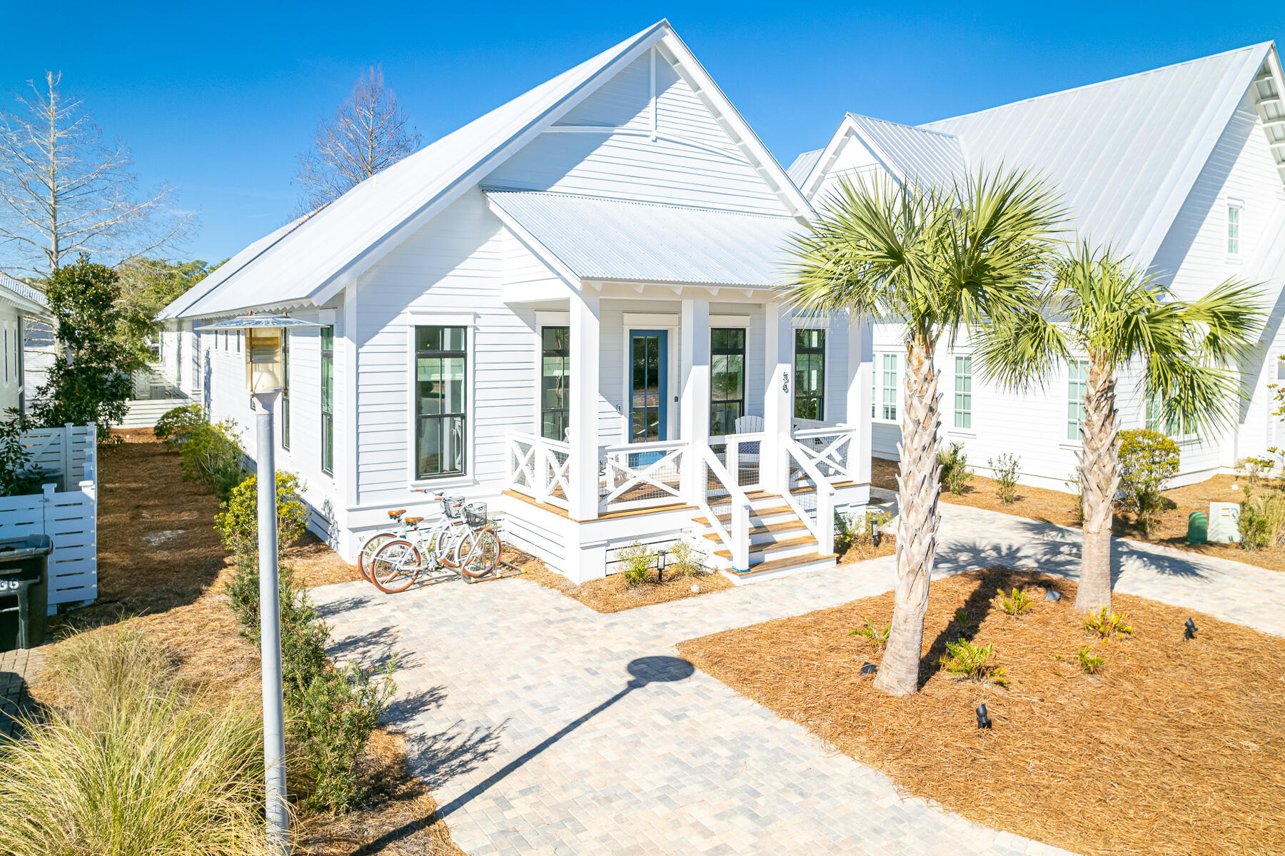 56 Cypress Drive Santa Rosa Beach, FL 32459 - Photo 30 of 61 a view of a dinning table and chairs in patio