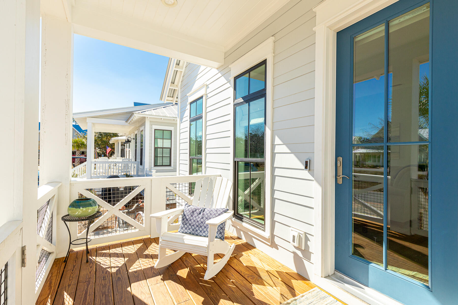 56 Cypress Drive Santa Rosa Beach, FL 32459 - Photo 45 of 61 a view of a patio with a dining table and chairs