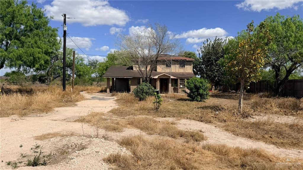 1524 West Hi Line Road Pharr, TX 78577 - Photo 12 of 34 a view of a house with a yard