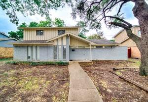 11219 Buchanan Drive Dallas, TX 75228 - Photo 1 of 1 a house with trees in the background