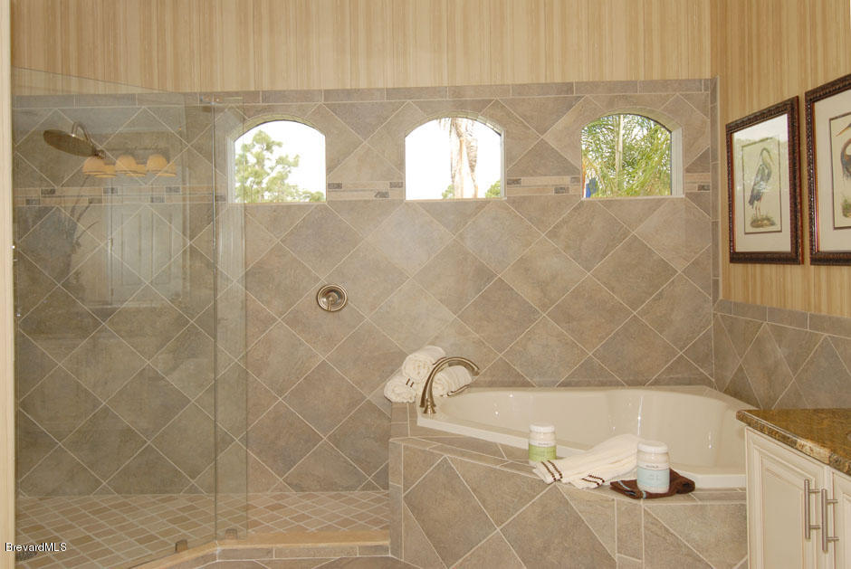 301 Riverside Drive Melbourne Beach, FL 32951 - Photo 1 of 11 masterbath11