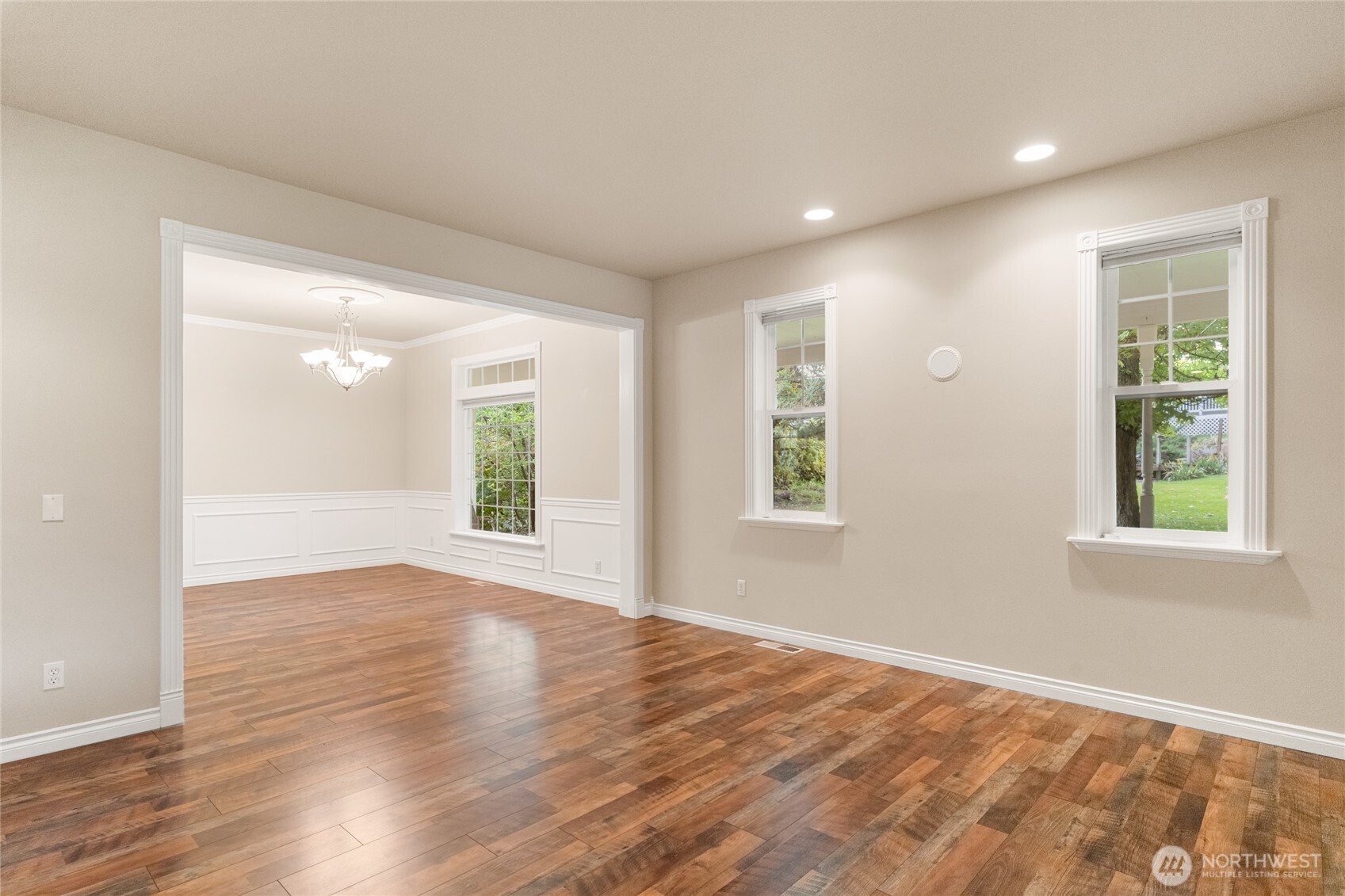 6005 Sunset Highway Cashmere, WA 98815 - Photo 11 of 40 a view of an empty room with wooden floor and a window
