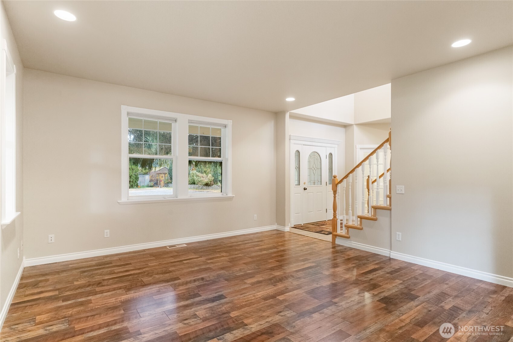 6005 Sunset Highway Cashmere, WA 98815 - Photo 12 of 40 a view of an empty room with wooden floor and a window