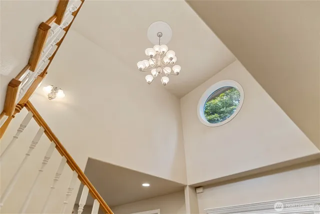 a view of a hallway with a chandelier