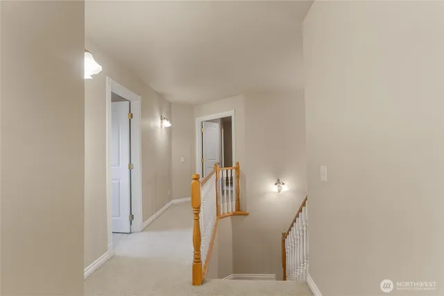 a view of hallway with stairs