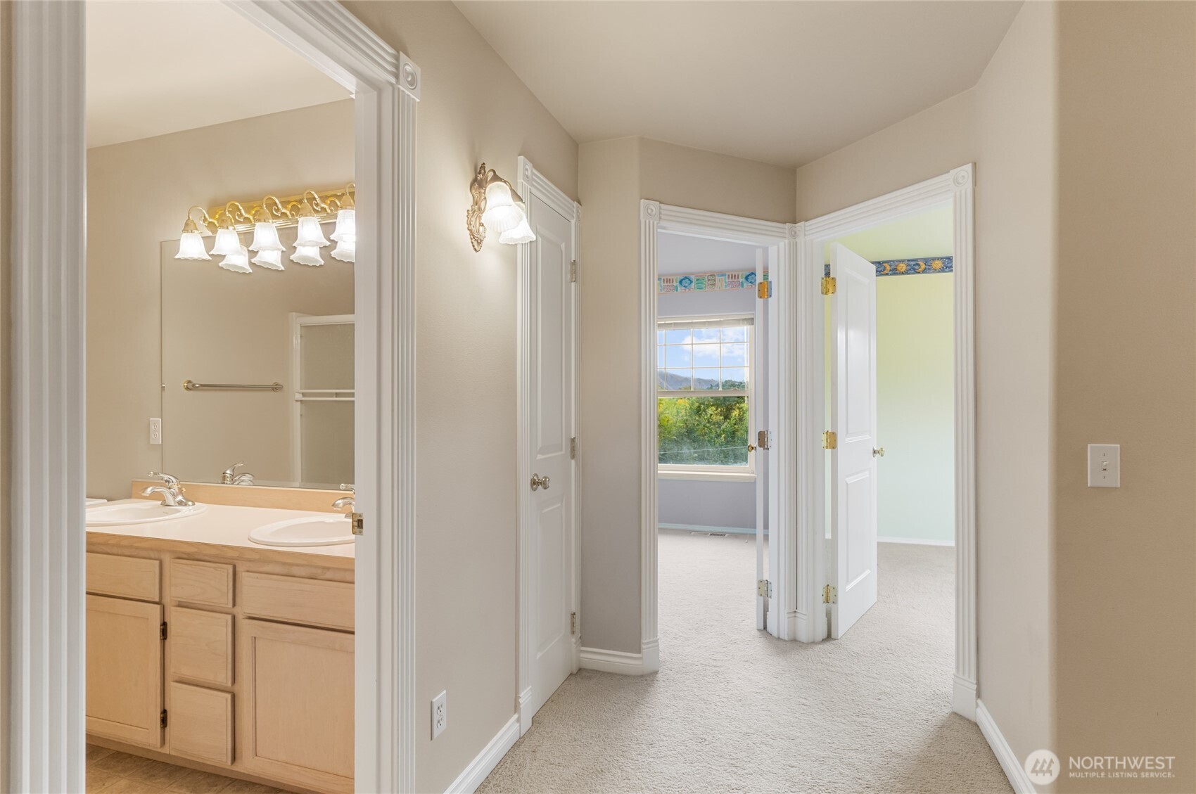6005 Sunset Highway Cashmere, WA 98815 - Photo 36 of 40 a bathroom with a double vanity sink and a mirror