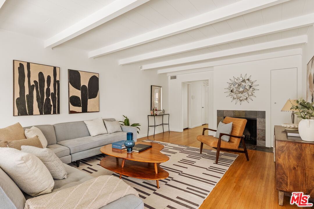 10749 Molony Road Culver City, CA 90230 - Photo 5 of 19 a living room with furniture and wooden floor