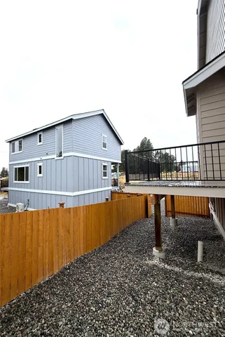 a view of swimming pool with a lounge chair