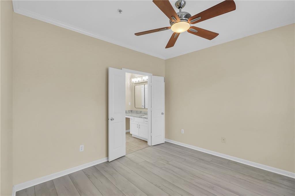 821 Ralph McGill Boulevard Northeast, Unit 3325 Atlanta, GA 30306 - Photo 23 of 54 wooden floor in an empty room