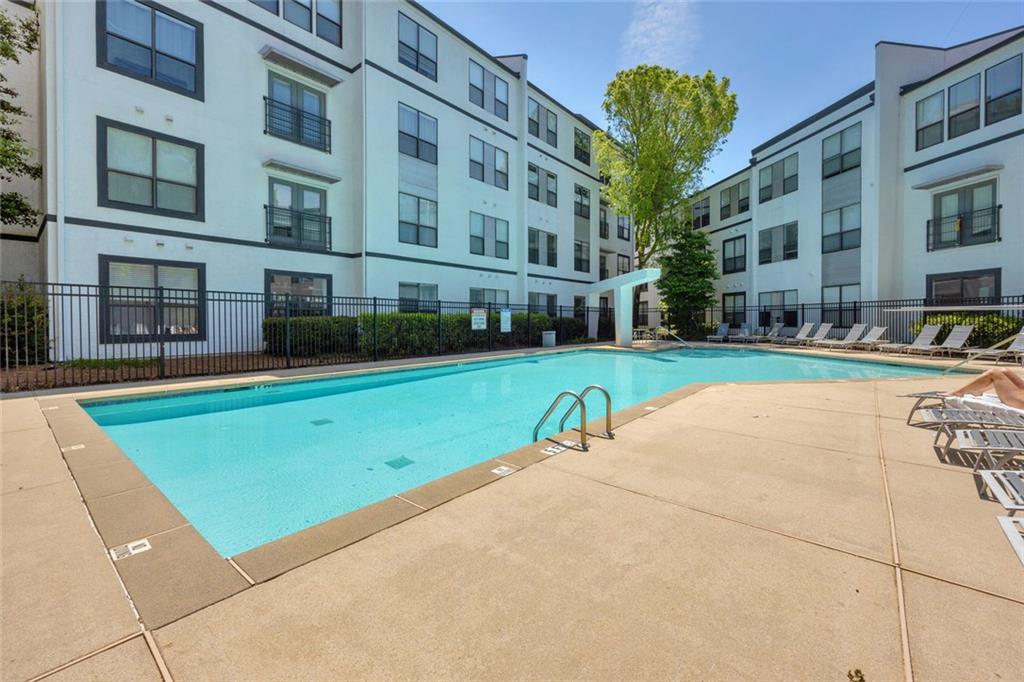 821 Ralph McGill Boulevard Northeast, Unit 3325 Atlanta, GA 30306 - Photo 32 of 54 a view of a building with a swimming pool