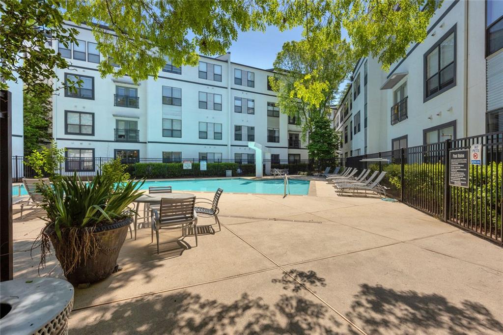 821 Ralph McGill Boulevard Northeast, Unit 3325 Atlanta, GA 30306 - Photo 33 of 54 a building with outdoor seating space