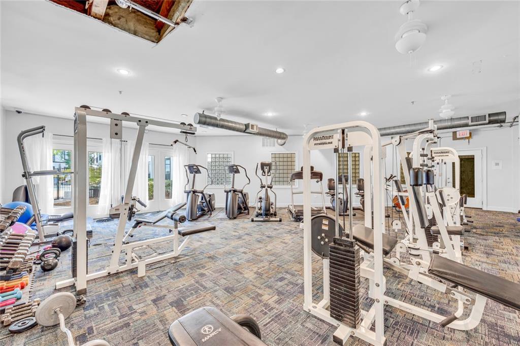 821 Ralph McGill Boulevard Northeast, Unit 3325 Atlanta, GA 30306 - Photo 36 of 54 a view of a room with gym equipment