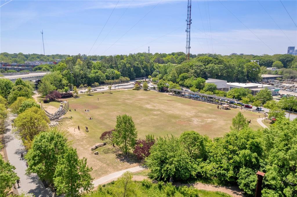 821 Ralph McGill Boulevard Northeast, Unit 3325 Atlanta, GA 30306 - Photo 53 of 54 a view of a garden with a building in the background