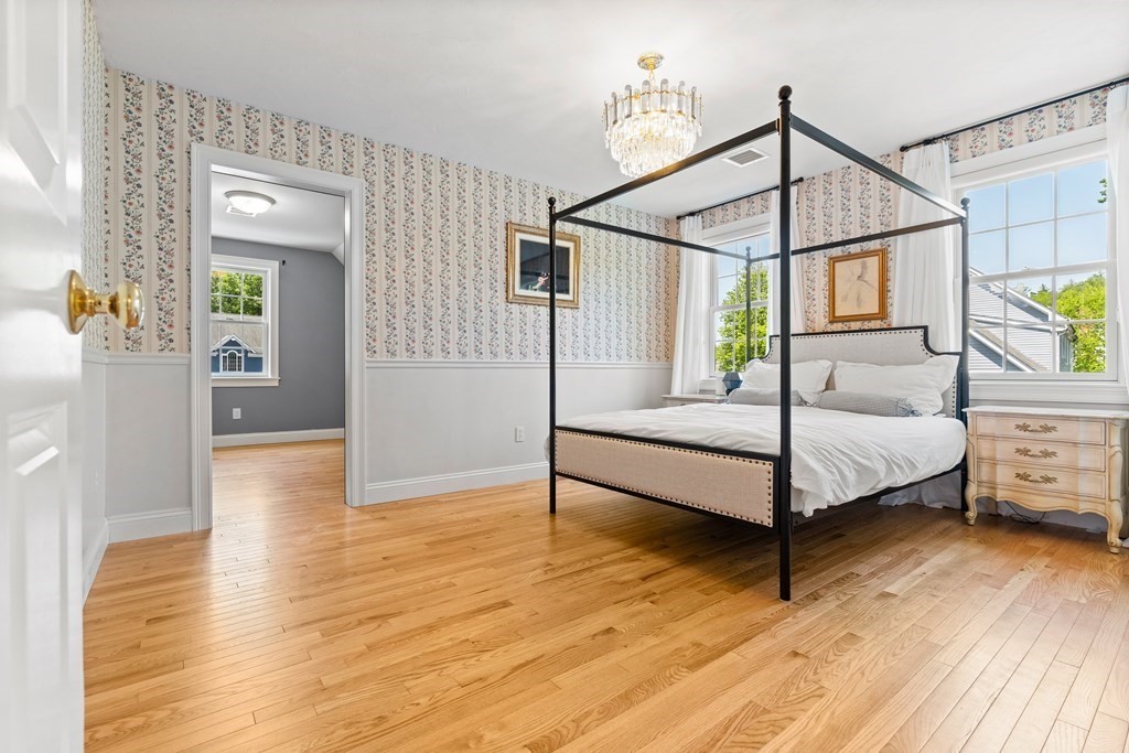 19 Village Road Pepperell, MA 01463 - Photo 21 of 41 a bedroom with a bed and a window