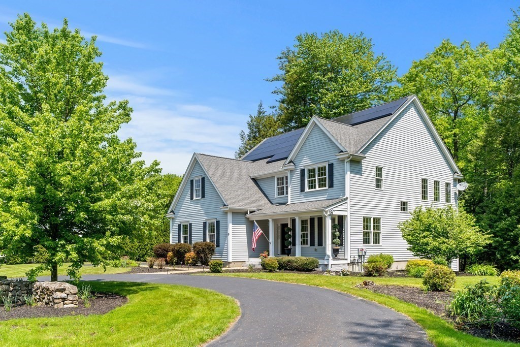 19 Village Road Pepperell, MA 01463 - Photo 38 of 41 a front view of a residential houses with yard and green space