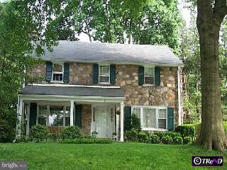 57 East Golf View Road Ardmore, PA 19003 - Photo 1 of 1 front view of a brick house with a yard