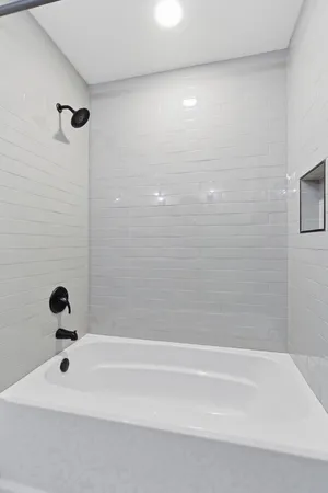 a bathroom with a bathtub